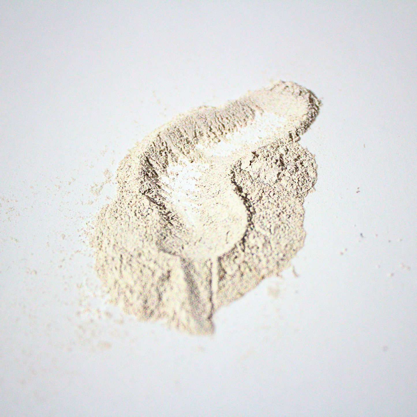 All natural body powder on white surface for Liv 4 You 2