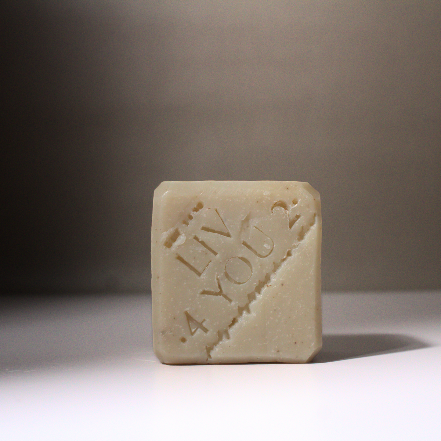 Bar of ivory colored earthy body soap  Liv 4 You 2