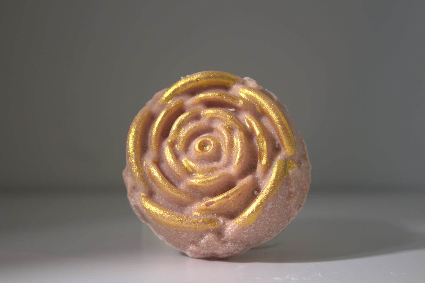 SEA SALT SPA BAR Rose shape with gold paint on white foundation and gray background